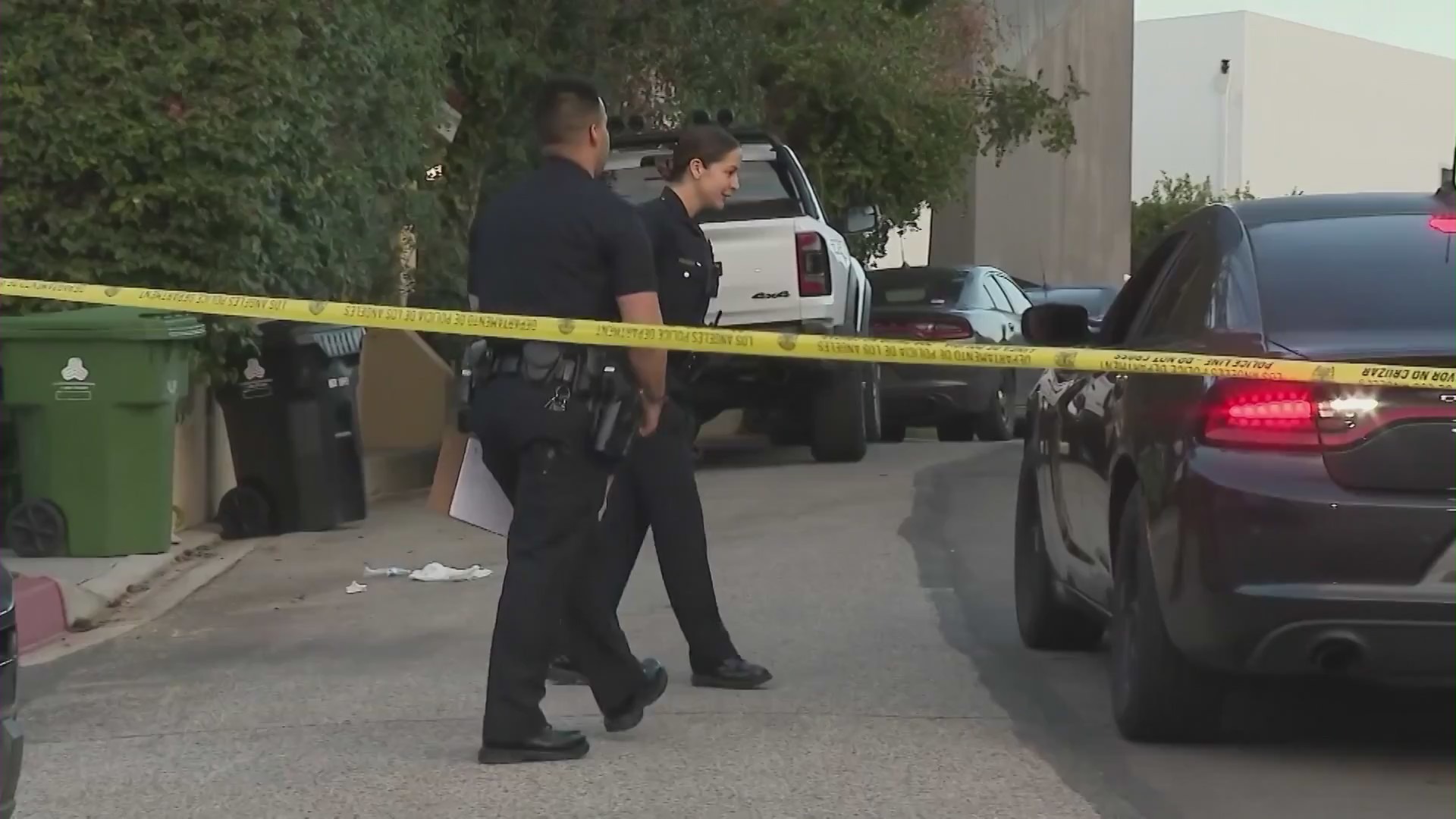 LAPD officers investigate the shooting that left 3 people dead in the Beverly Crest neighborhood of Los Angeles on Jan. 28, 2023. (KTLA)