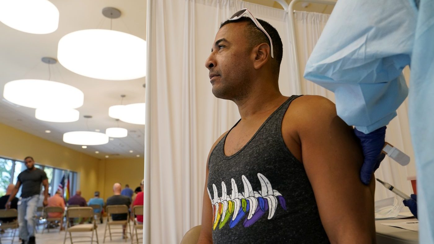 Danya Rosario receives a monkeypox vaccine at The Pride Center on Aug. 10, 2022, in Wilton Manors, Fla. (AP Photo/Lynne Sladky)