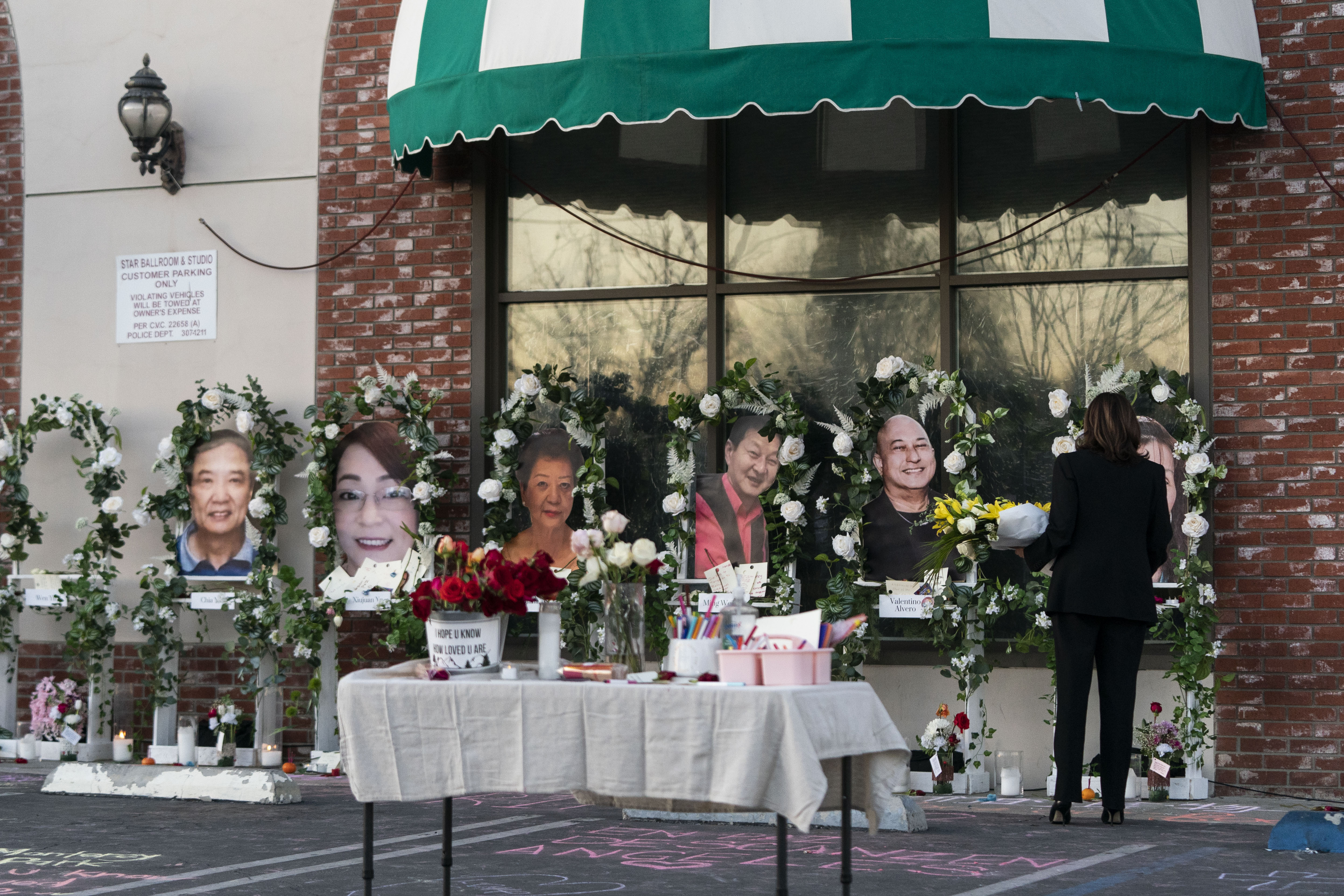 Vice President Kamala Harris visits a memorial set up outside Star Dance Studio in Monterey Park on Jan. 25, 2023, to honor the victims killed a mass shooting. ( Jae C. Hong/Associated Press)