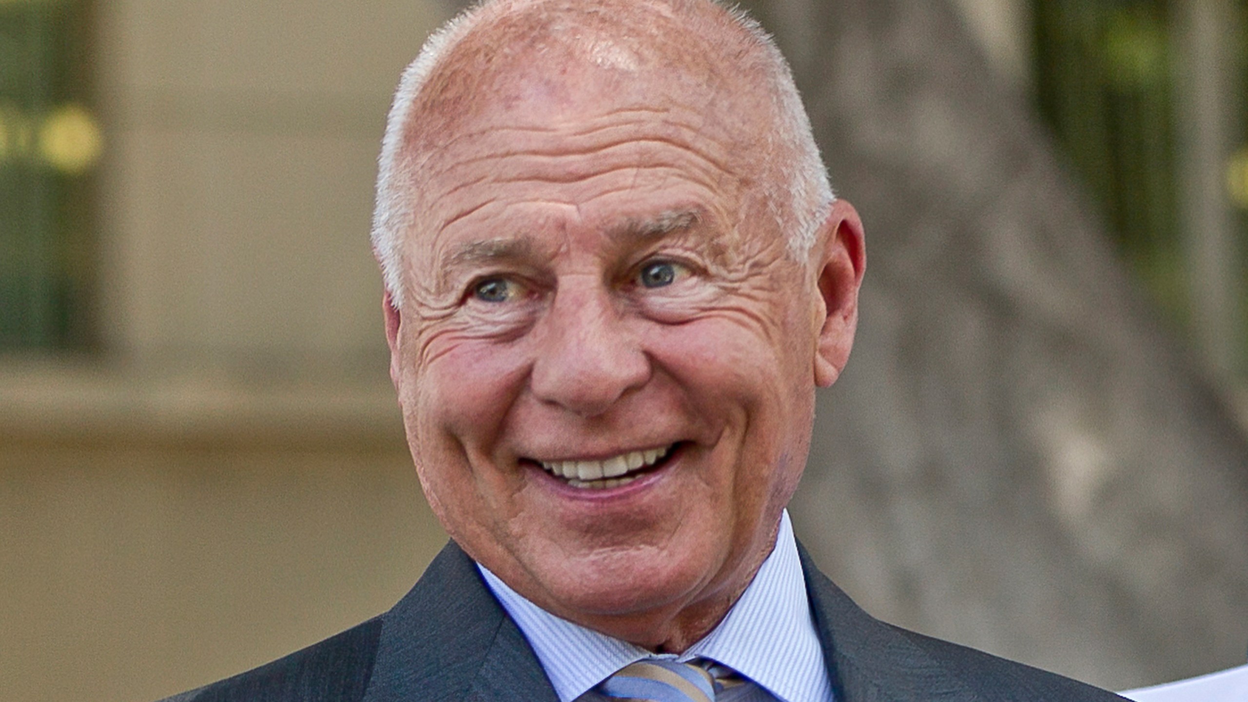 Attorney Tom Girardi smiles outside the Los Angeles courthouse on July 9, 2014. (Damian Dovarganes/Associated Press)