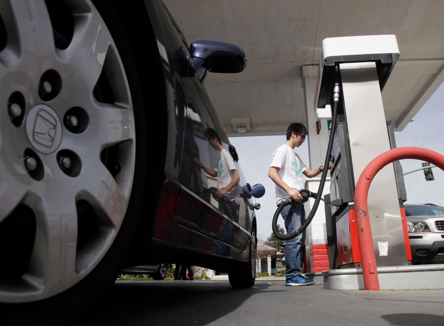 A motorist fuels up at a gas station in Santa Cruz, Calif., Monday, March 7, 2011. A leak in a fuel pipeline facility in California has forced a shutdown of deliveries of gasoline and diesel from the Los Angeles to areas including Las Vegas and Phoenix. (AP Photo/Marcio Jose Sanchez, File)