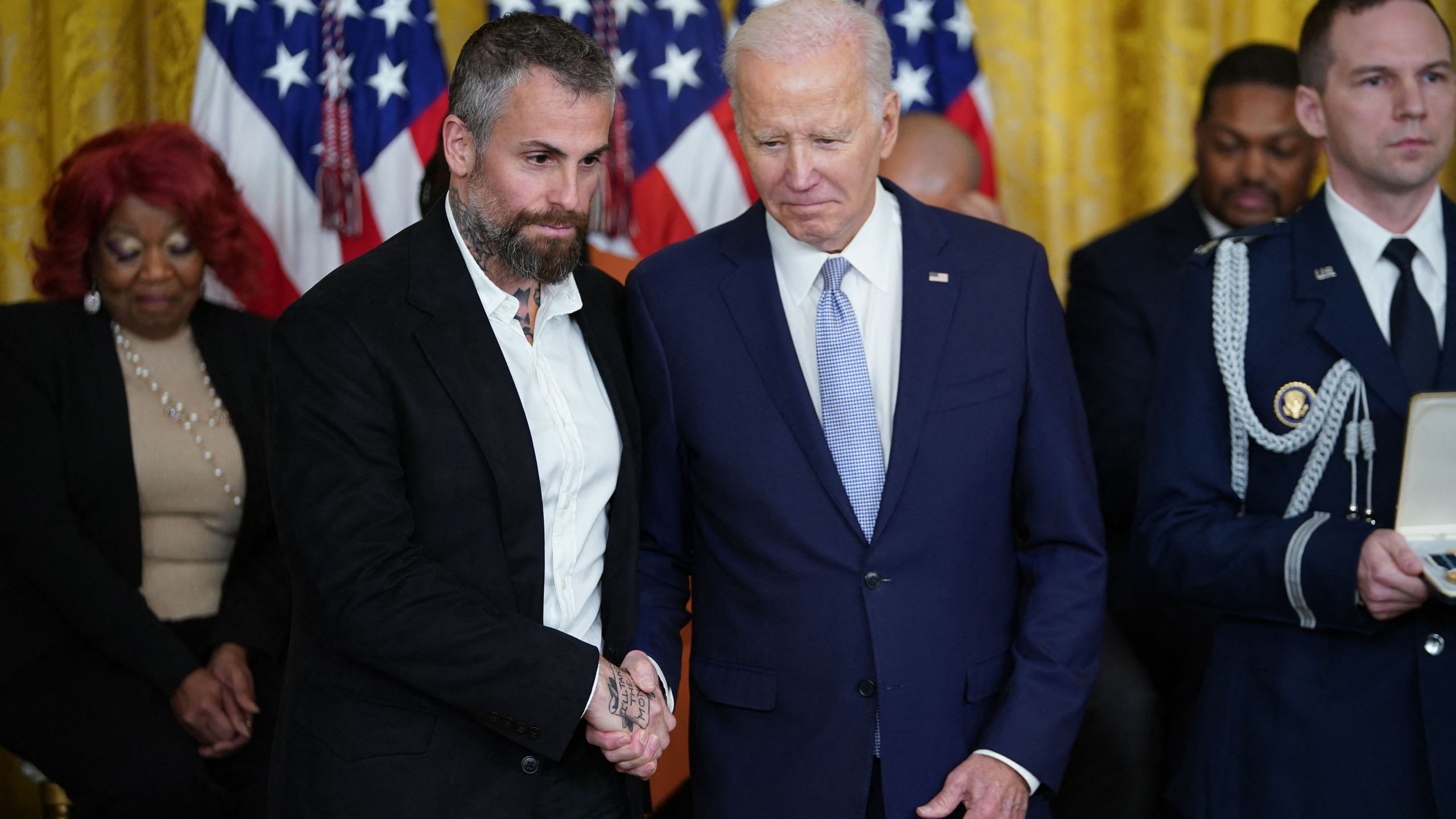 President Joe Biden, right, awards the Presidential Citizens Medal to former Metropolitan Police Department Officer Michael Fanone during a ceremony marking the second anniversary of the Jan. 6, 2021, attack on the U.S. Capitol in the East Room of the White House. (Mandel NGAN / AFP via Getty Images)