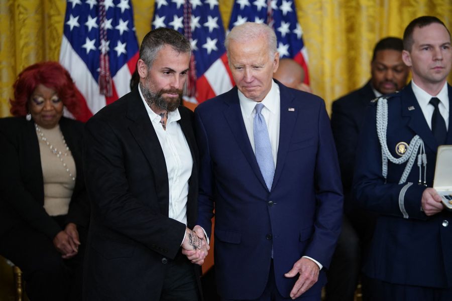 President Joe Biden, right, awards the Presidential Citizens Medal to former Metropolitan Police Department Officer Michael Fanone during a ceremony marking the second anniversary of the Jan. 6, 2021, attack on the U.S. Capitol in the East Room of the White House. (Mandel NGAN / AFP via Getty Images)