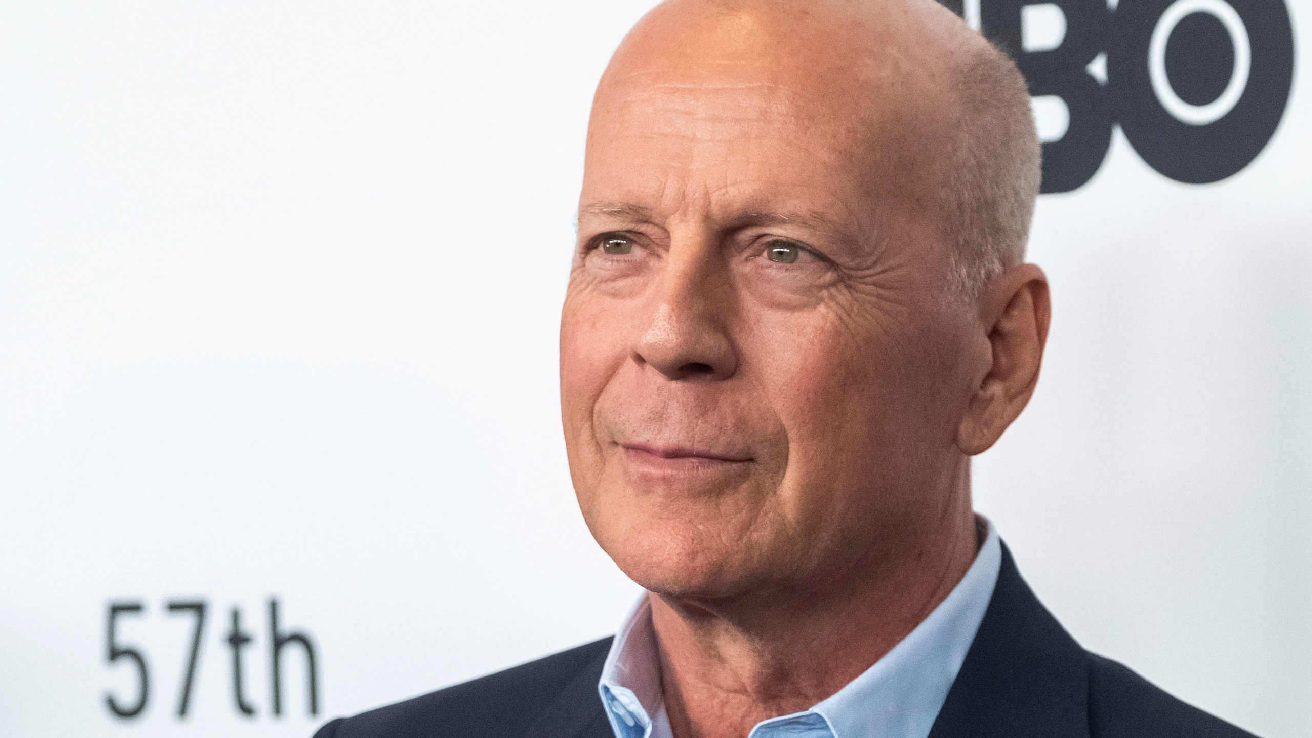 Bruce Willis attends a movie premiere