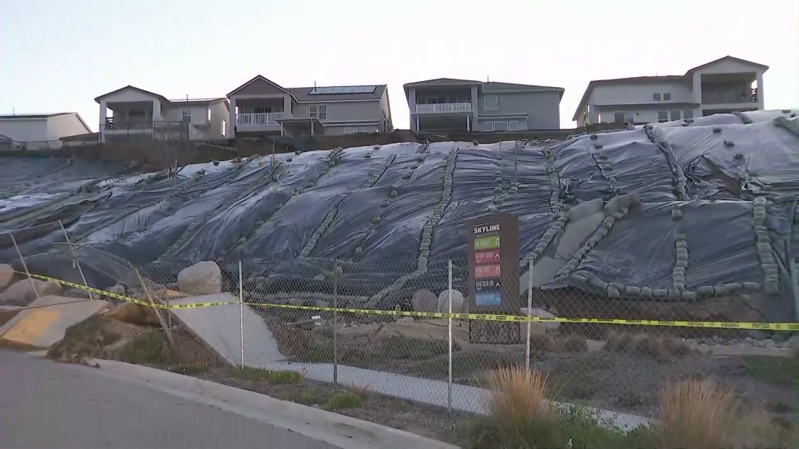 Several homes were yellow tagged after a rockslide in a Canyon Country community on Feb. 6, 2023. (KTLA)