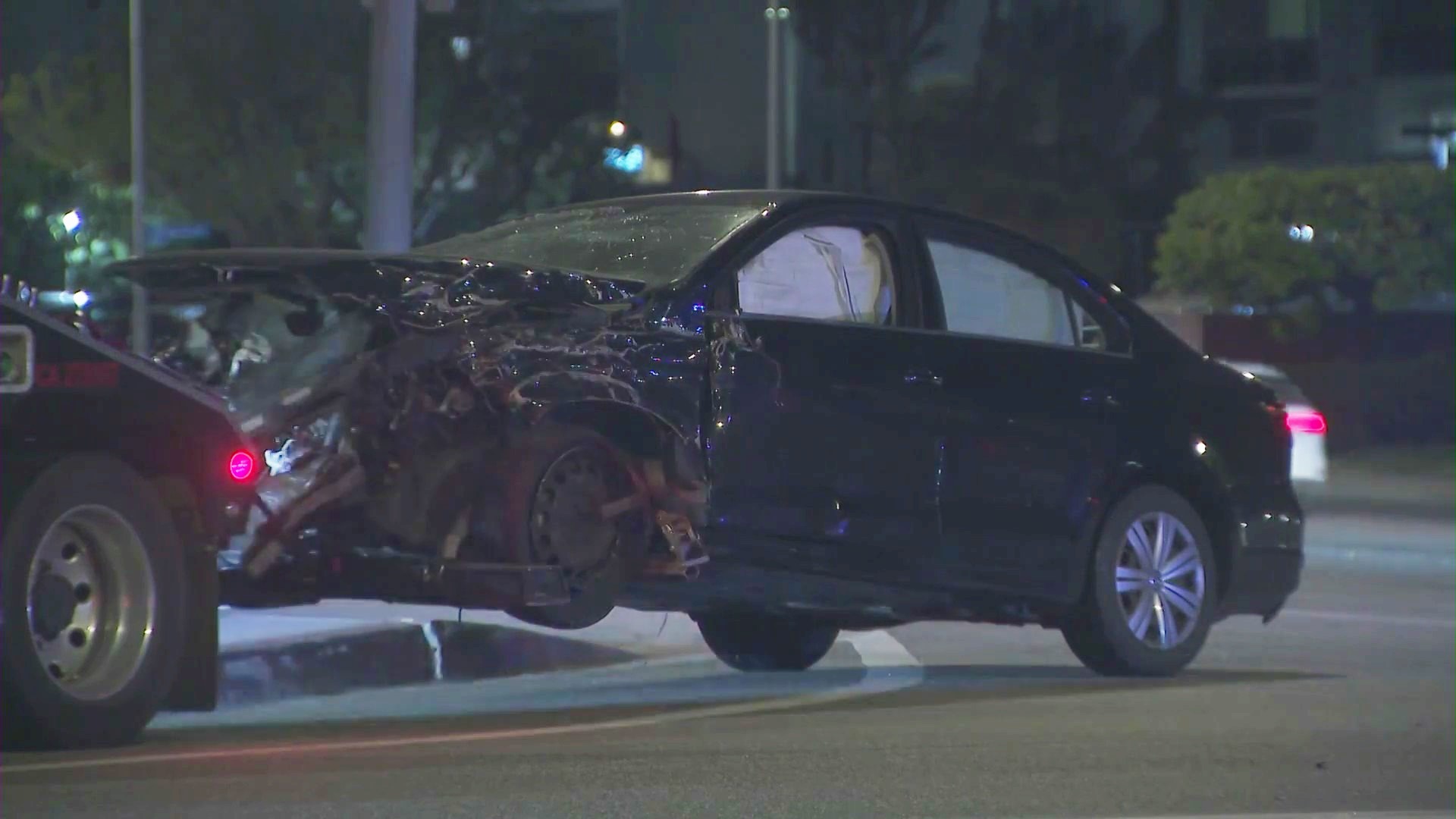 Six people were hospitalized after a three-vehicle crash in Woodland Hills on Feb. 11, 2023. (KTLA)