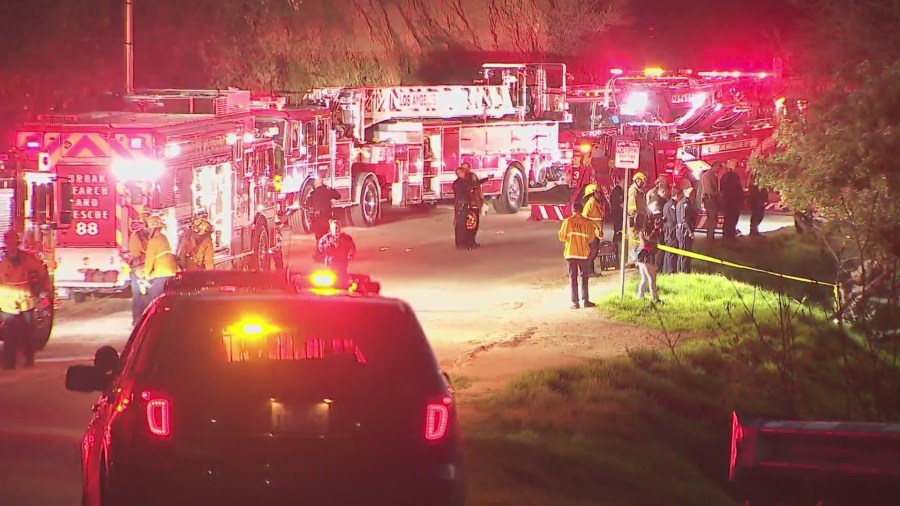 A woman was hospitalized after her vehicle went down a 100-foot embankment in Beverly Crest on Feb. 4, 2023. (KTLA)