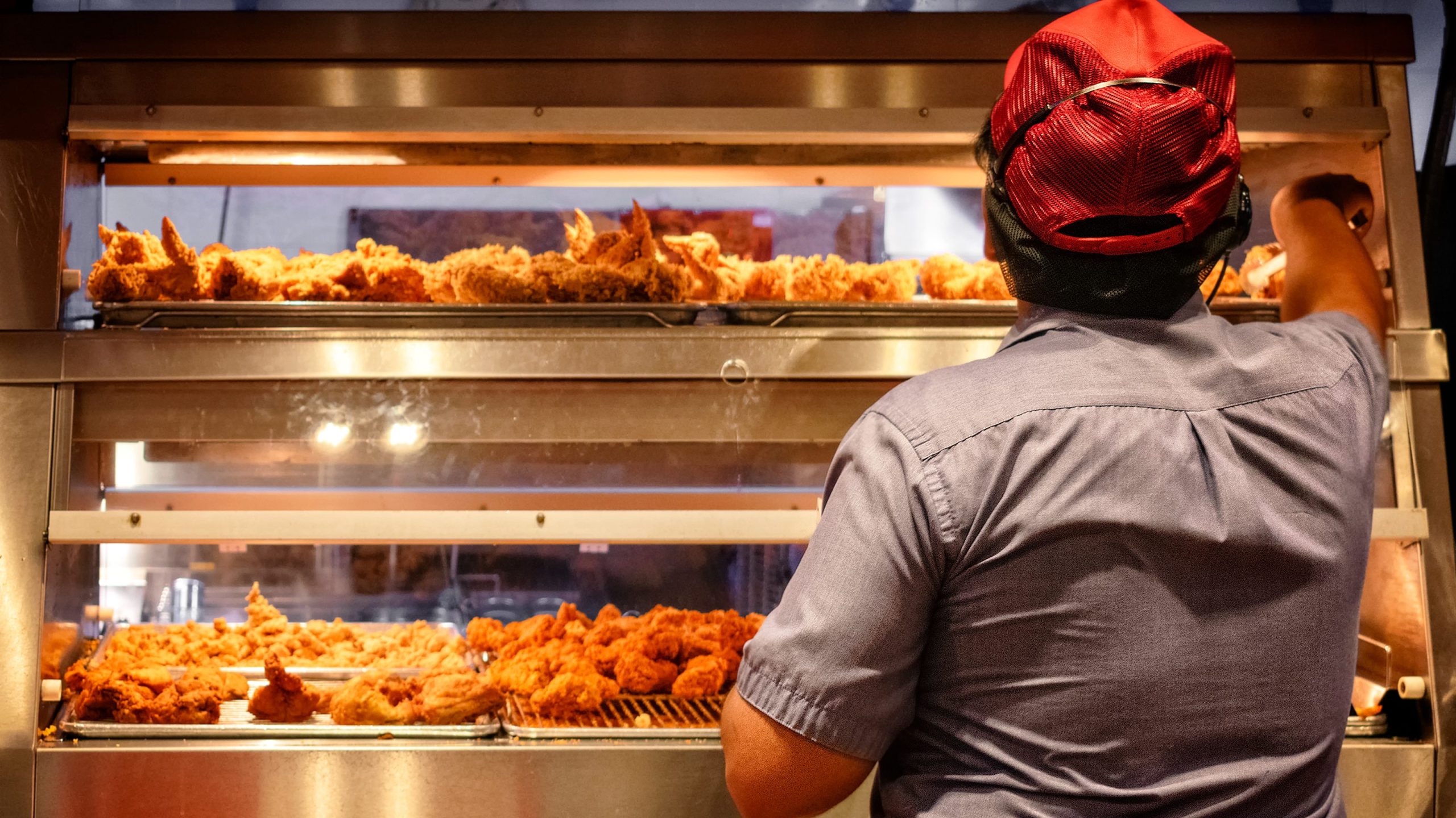 Minimum Wage Employee Works in a Fast Food Kitchen.