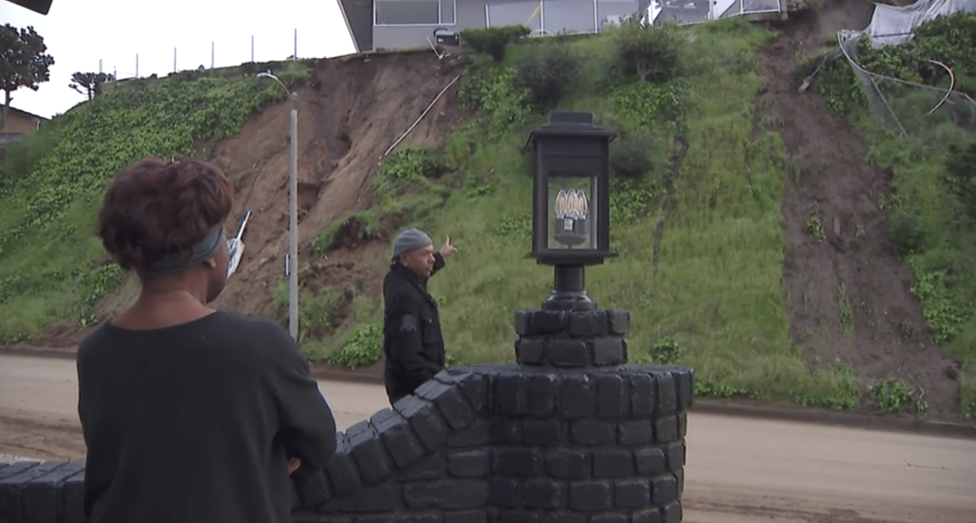 Baldwin Hills residents below a mudslide were left a substantial mess of debris and mud that crews worked to clear Mar. 15, 2023 (KTLA).