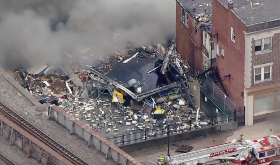 Smoke rises from an explosion at the R.M. Palmer Co. plant in West Reading, Pa. on, Friday, March 24, 2023. (WPVI-TV/6ABC via AP)