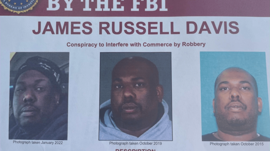 James Russell Davis is seen in a wanted poster displayed during a news conference on March 2, 2023. (KTLA) 