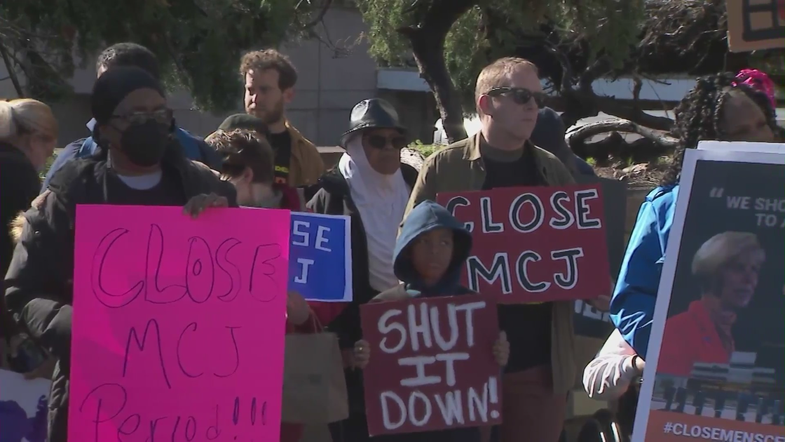 Demonstrators gather near the Los Angeles County Board of Supervisors Office to demand the closure of Men's Central Jail on March 30, 2023. (KTLA)