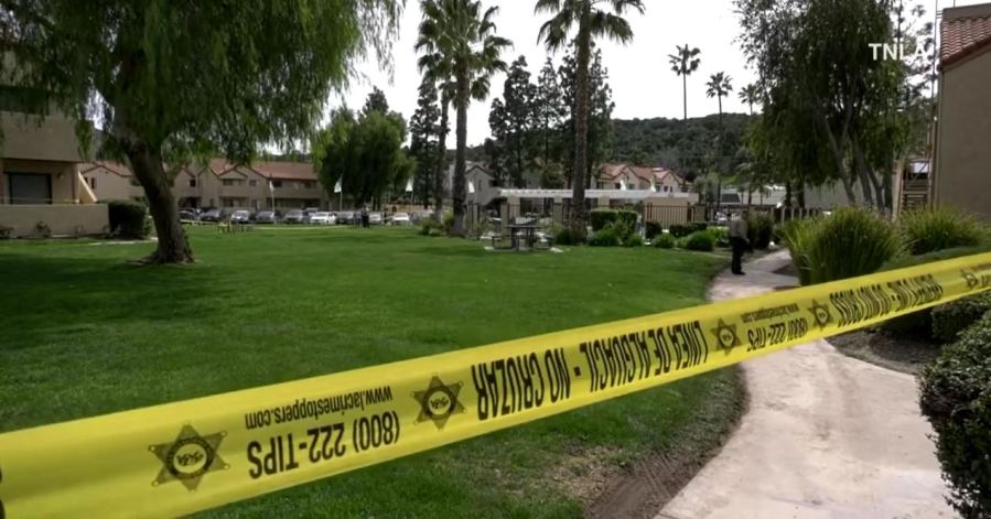 Two people were fatally shot while sitting by the pool in a Newhall apartment complex on March 18, 2023. (TNLA)