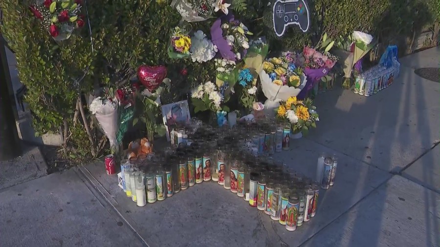 Loved ones mourn Xavier Chavarin in an El Sereno memorial on March 7, 2023. (KTLA)