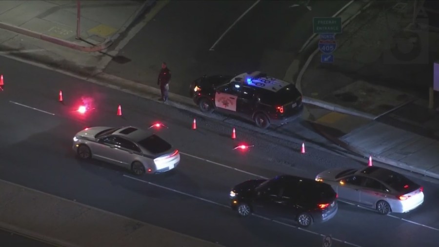 The California Highway Patrol shut down 405 Freeway lanes in Hawthorne after a shooting involving CHP officers on March 30, 2023. (KTLA)