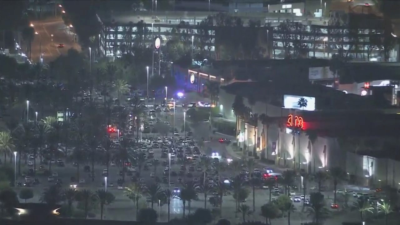 Police investigating a shooting that left one injured at The Outlets at Orange on March 17, 2023. (KTLA)