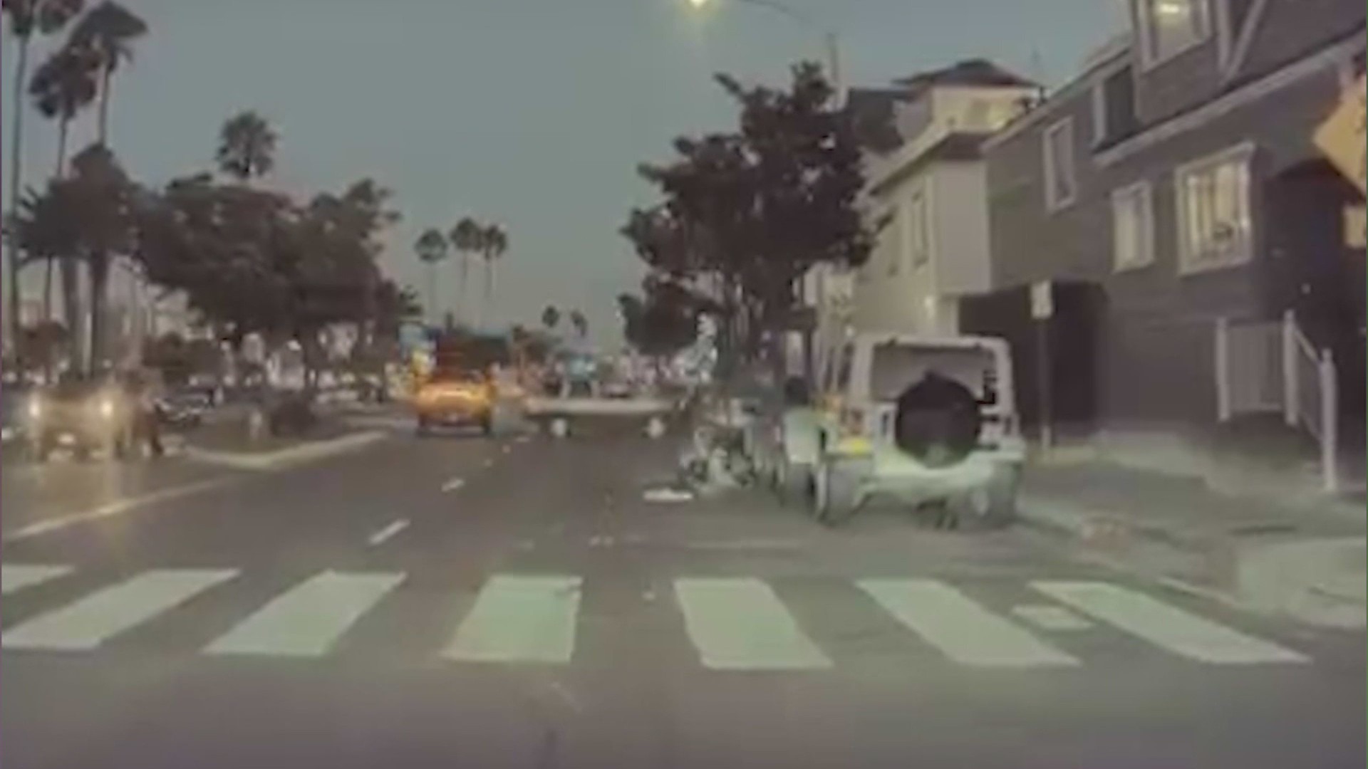 Dashcam captured the moment Mike Landry was violently run over by an SUV in Newport Beach. (Mike Landry)