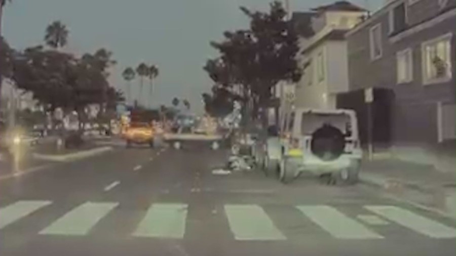 Dashcam captured the moment Mike Landry was violently run over by an SUV in Newport Beach. (Mike Landry)