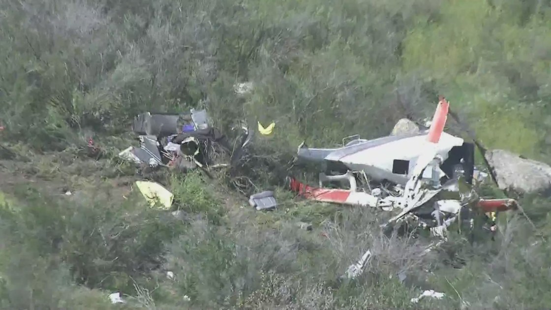 The scene of a helicopter crash that killed two people in a remote area just east of Perris on March 24, 2023. (KTLA)