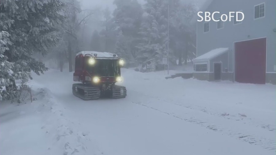 Emergency crews dig out homes and roads after a historic winter snowstorm in SoCal mountain communities. (San Bernardino County Fire Dept.)