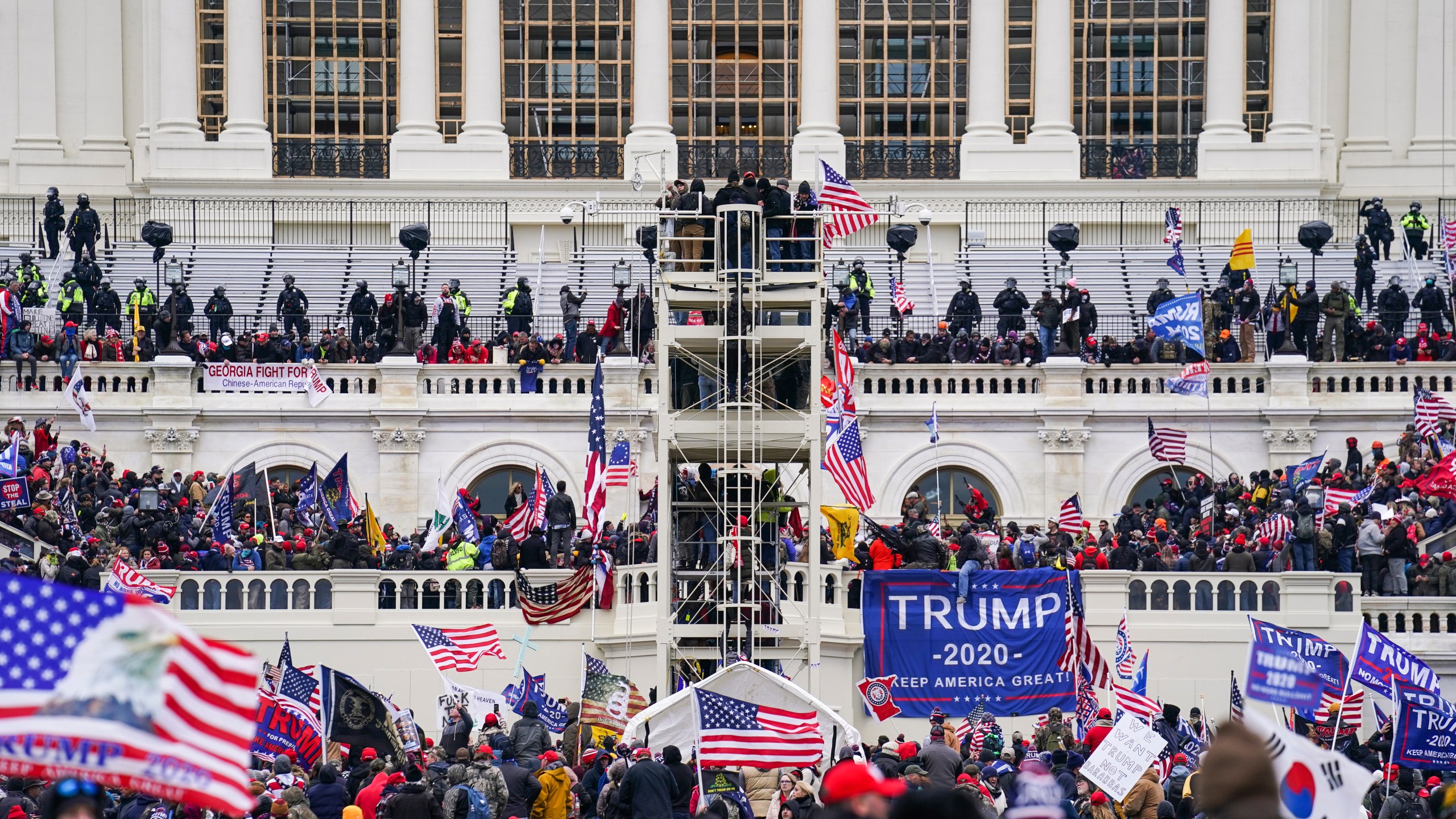 Insurrectionists loyal to President Donald Trump breach the U.S. Capitol in Washington, on Jan. 6, 2021. (AP Photo/John Minchillo)