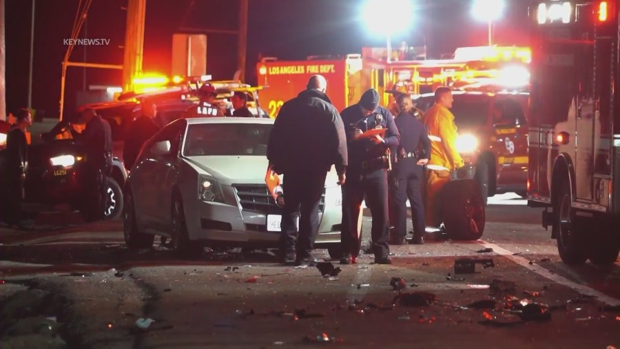 A driver allegedly under the influence smashed into parked cars along PCH on April 8, 2023, sending them careening toward pedestrians on the oceanside rocks below. (KeyNews.TV)