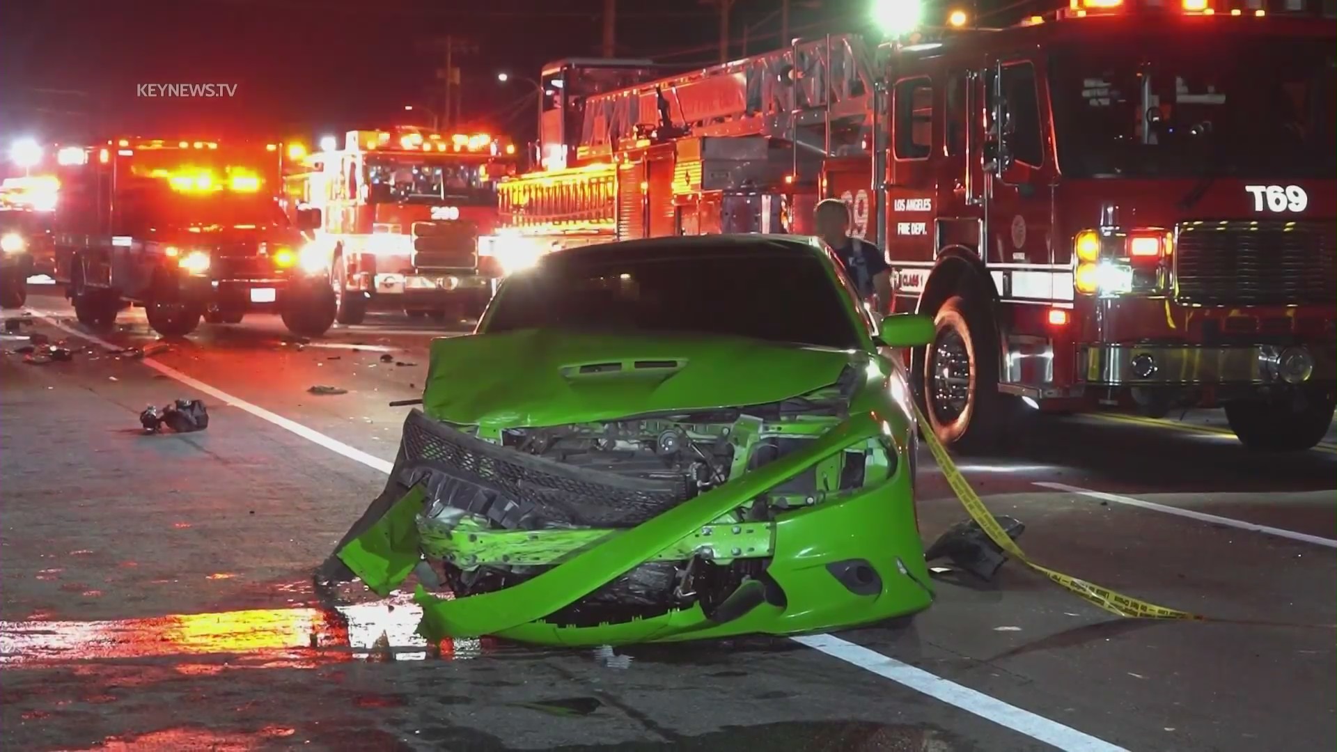 A driver allegedly under the influence smashed into parked cars along PCH on April 8, 2023, sending them careening toward pedestrians on the oceanside rocks below. (KeyNews.TV)