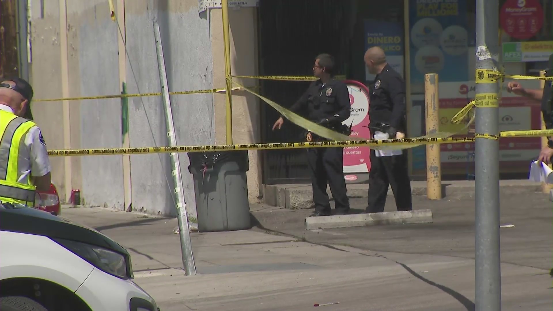 One man was killed and three others were wounded after being shot in a Northridge strip mall on April 15, 2023. (KTLA)