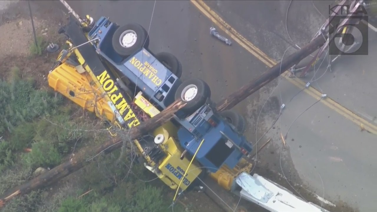 The driver of a crane vehicle was killed after crashing into a power pole in Malibu on April 5, 2023. (KTLA)