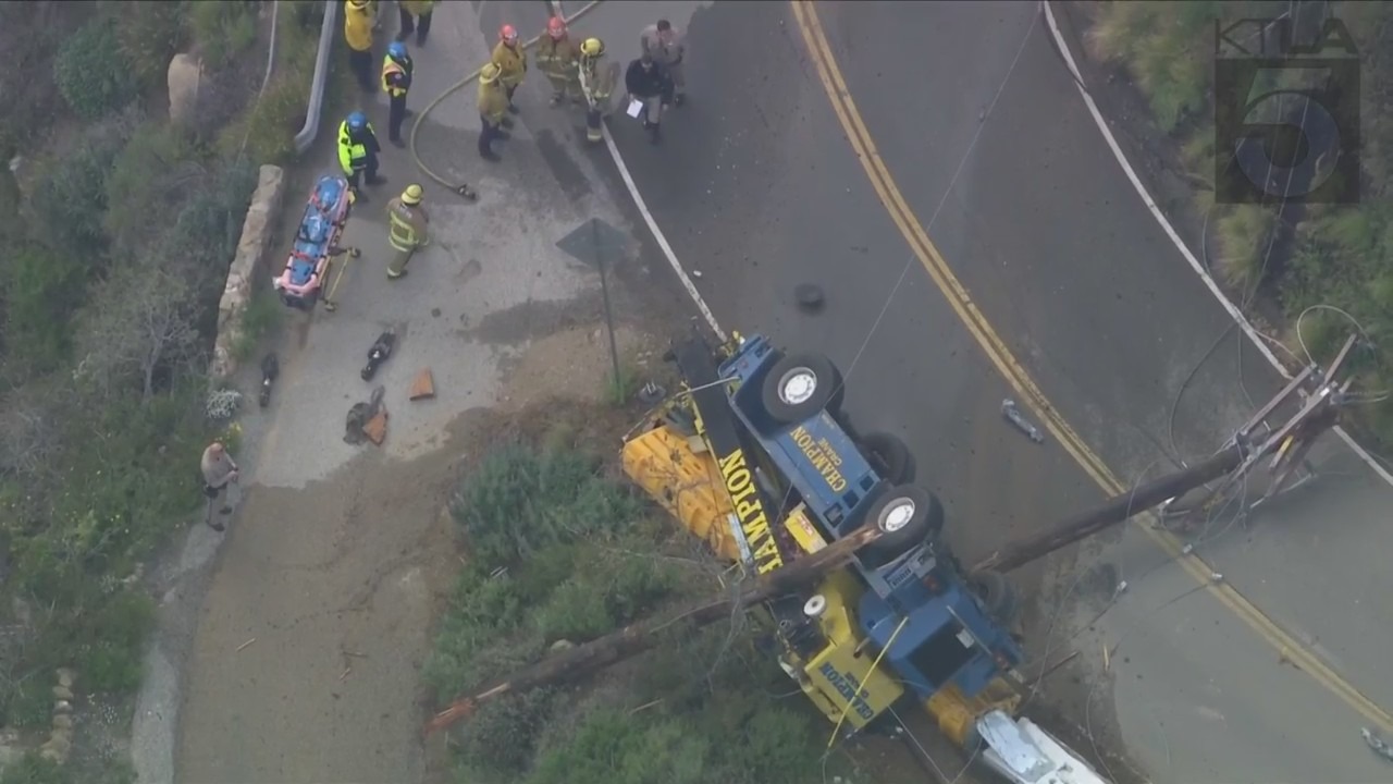 The driver of a crane vehicle was killed after crashing into a power pole in Malibu on April 5, 2023. (KTLA)