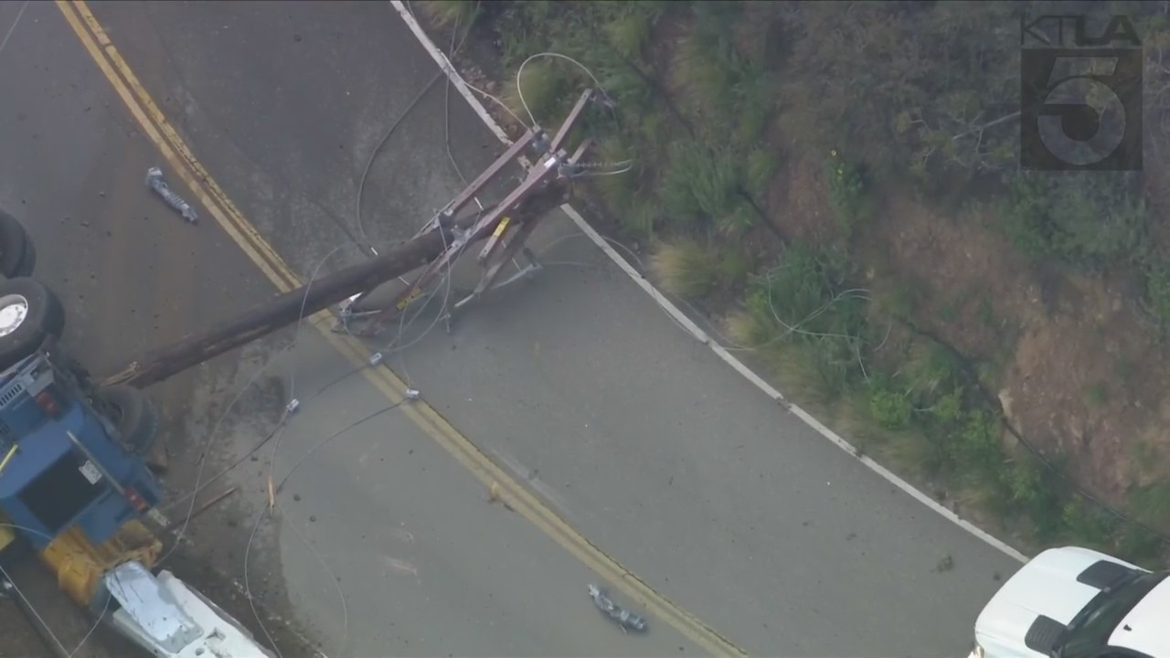 The driver of a crane vehicle was killed after crashing into a power pole in Malibu on April 5, 2023. (KTLA)