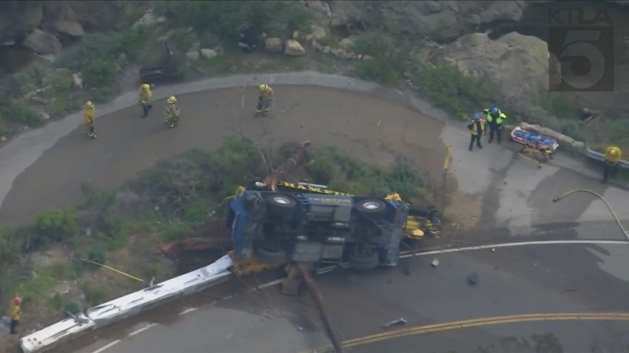 The driver of a crane vehicle was killed after crashing into a power pole in Malibu on April 5, 2023. (KTLA)