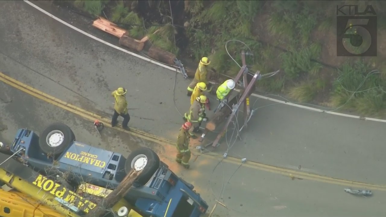 The driver of a crane vehicle was killed after crashing into a power pole in Malibu on April 5, 2023. (KTLA)