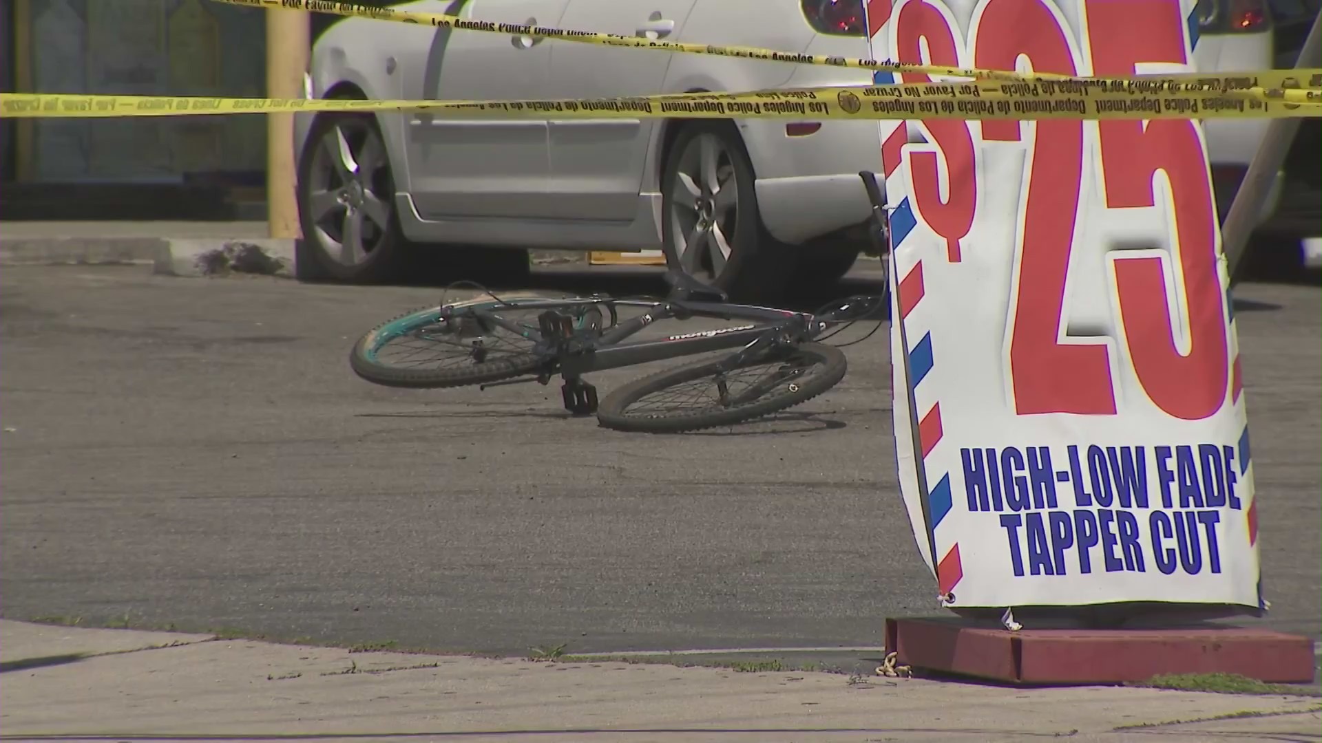 One man was killed and three others were wounded after being shot in a Northridge strip mall on April 15, 2023. (KTLA)