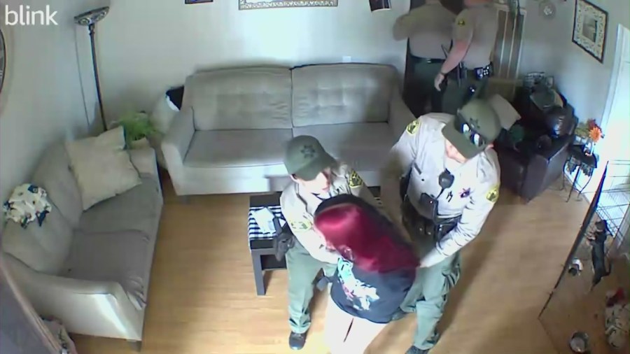 Home security video captures the moment a San Gabriel mother said authorities had wrongfully entered her home and detained her children for no reason on Oct. 22, 2022. (Cordova Family)