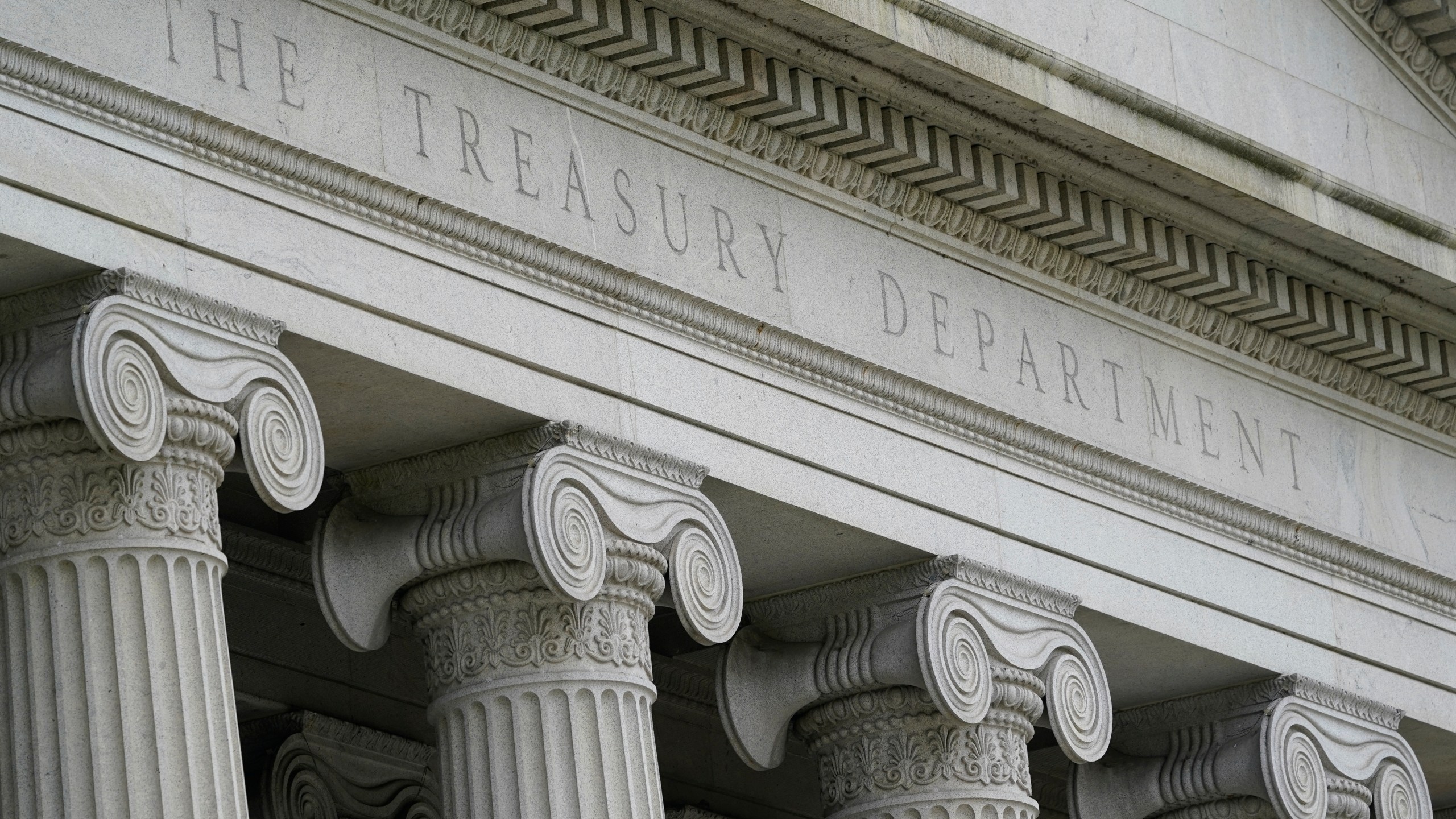 FILE - The Treasury Building is viewed in Washington, May 4, 2021. The Treasury Department designated El Chapo's son Joaquin Guzman Lopez and others for financial sanctions, including a freeze on American-owned assets and bank accounts and a ban on Americans doing business with them. (AP Photo/Patrick Semansky, File)