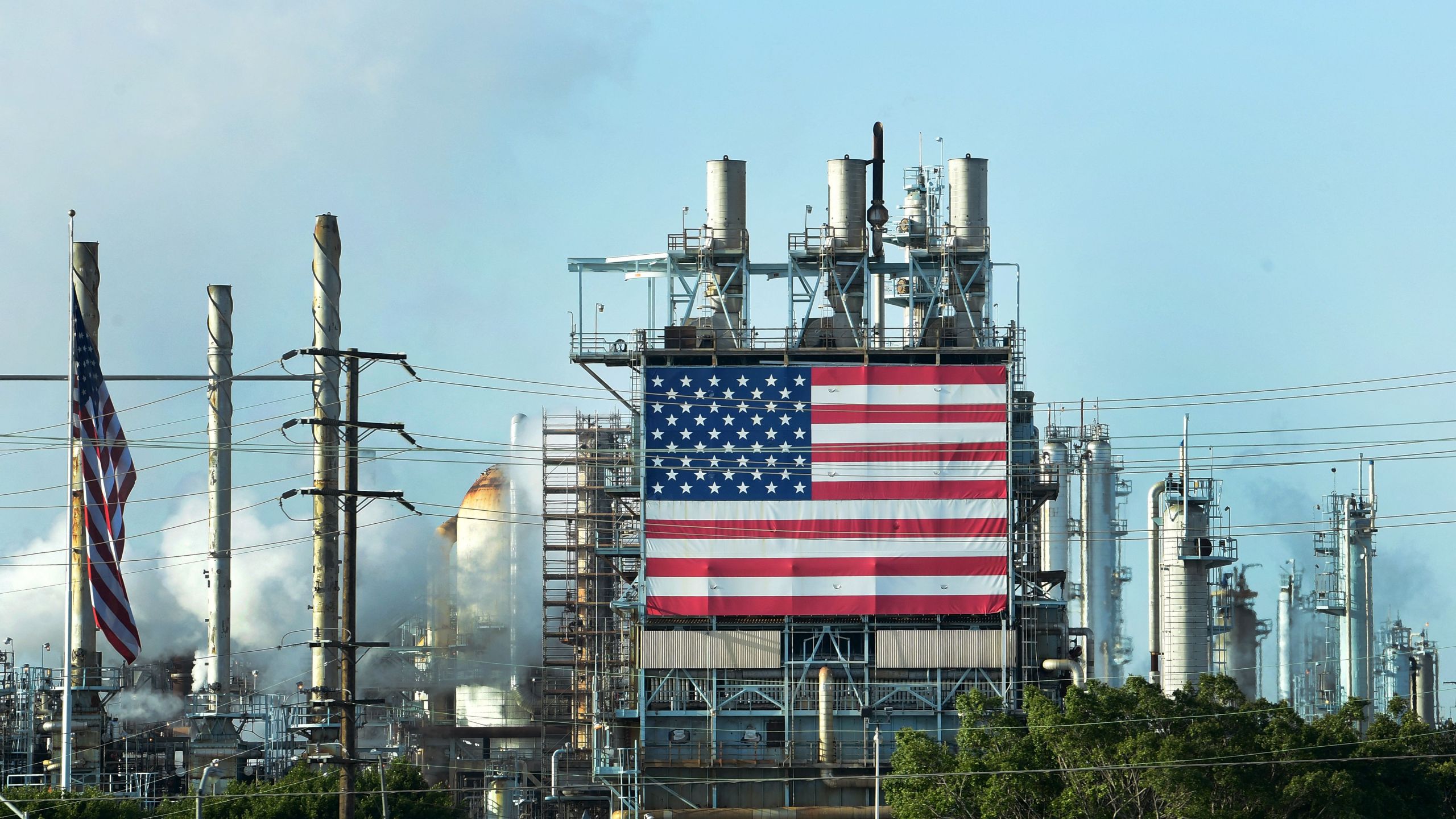 The US flag is displayed at the Wilmington Oil Fields south of Los Angeles, California on April 21, 2020. (Getty Images)