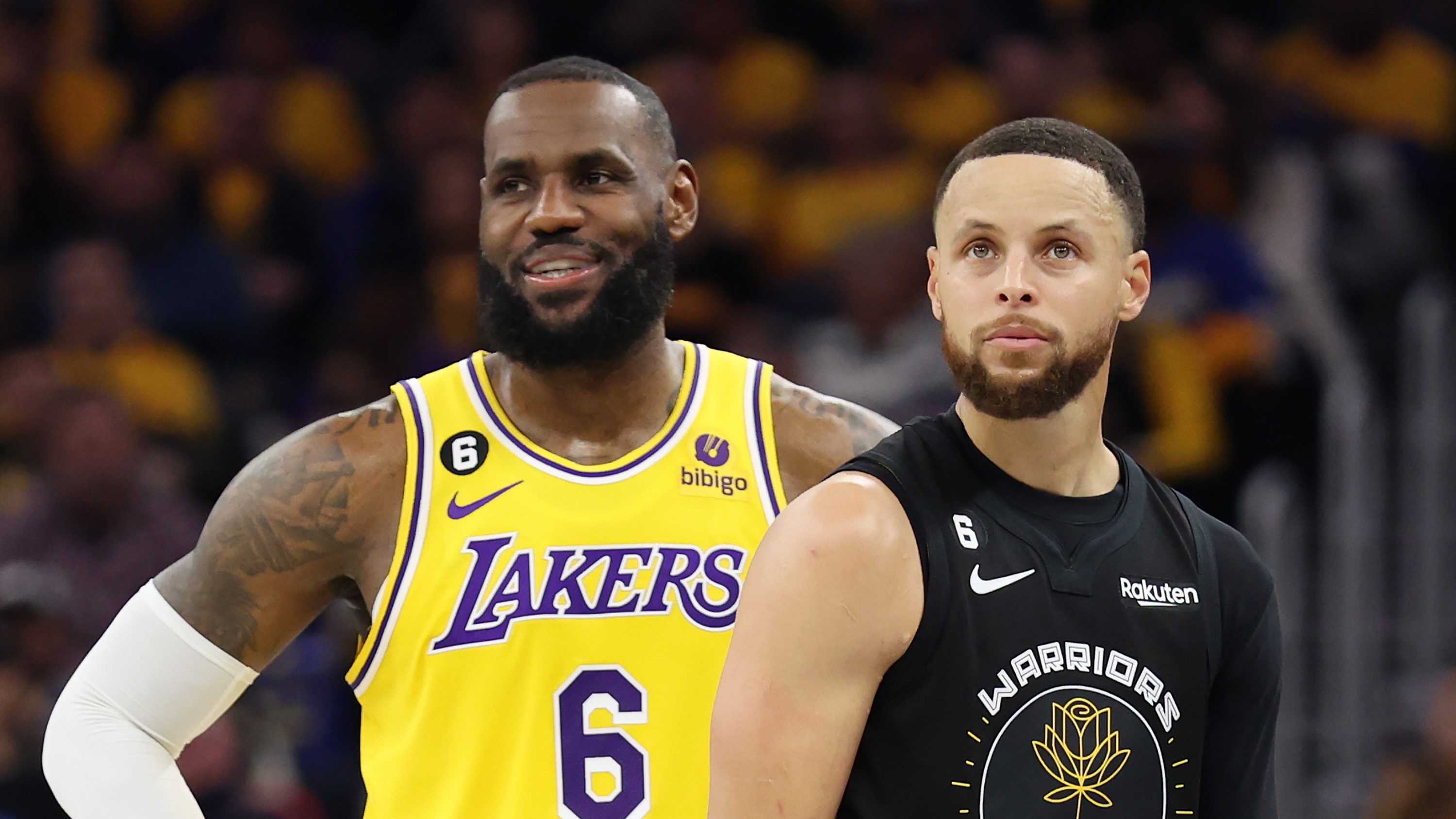 LeBron James #6 of the Los Angeles Lakers stands next to Stephen Curry #30 of the Golden State Warriors during the second quarter in game one of the Western Conference Semifinal Playoffs at Chase Center on May 02, 2023 in San Francisco, California. (Getty Images)