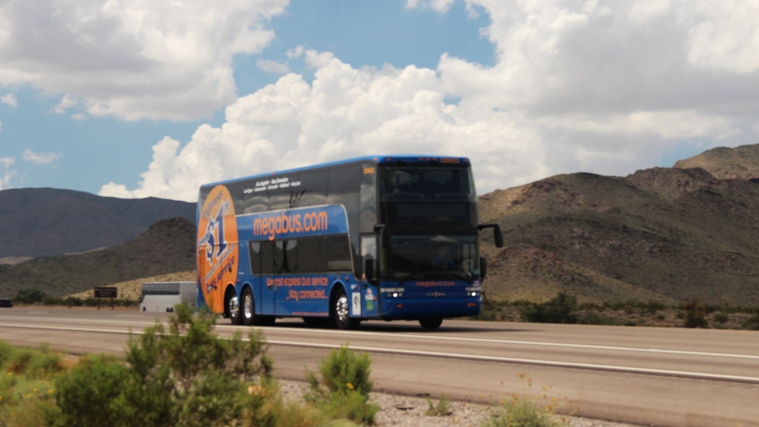 This undated promotional image shows a Megabus bus driving between Los Angeles and Las Vegas. (Megabus)