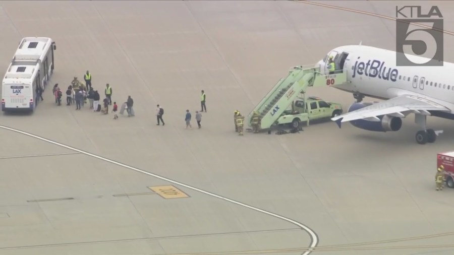 A JetBlue flight from las Vegas to Los Angeles was evacuated after reports of a suspicious package on board. (KTLA)