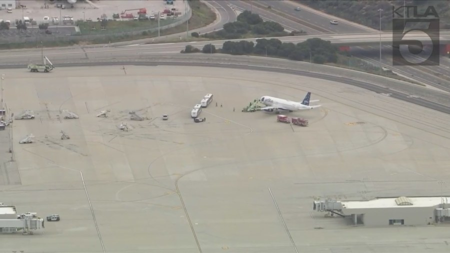 A JetBlue flight from las Vegas to Los Angeles was evacuated after reports of a suspicious package on board. (KTLA)