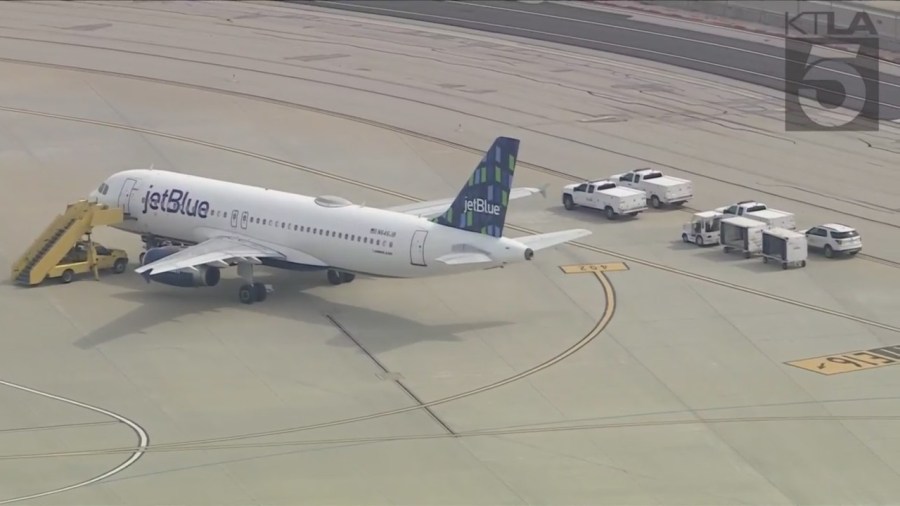 A JetBlue flight from las Vegas to Los Angeles was evacuated after reports of a suspicious package on board. (KTLA)