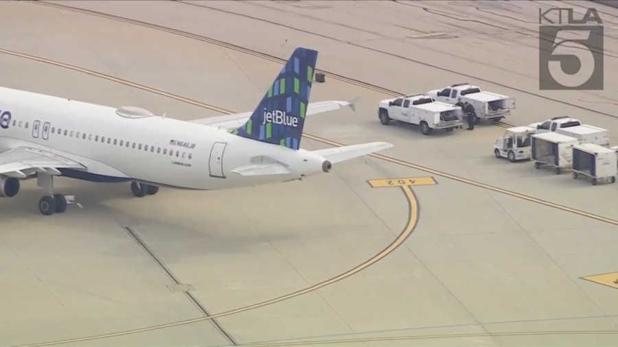 A JetBlue flight from las Vegas to Los Angeles was evacuated after reports of a suspicious package on board. (KTLA)