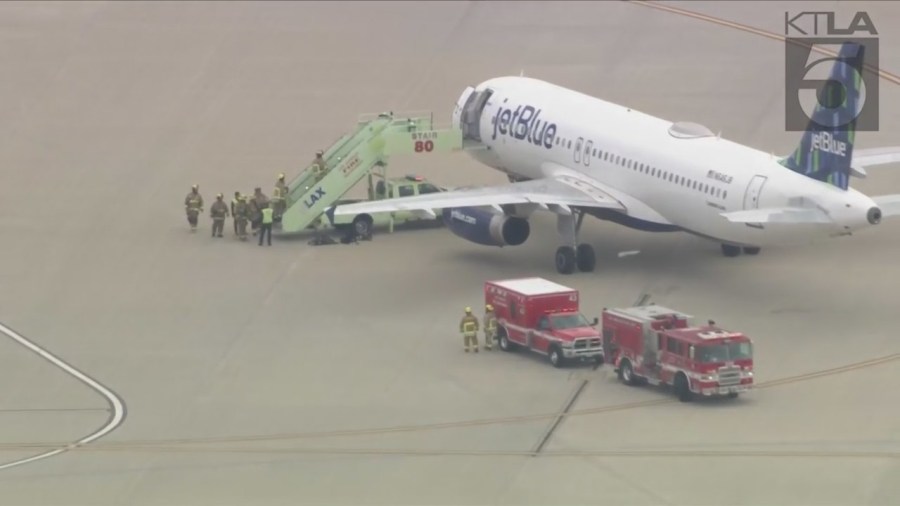 A JetBlue flight from las Vegas to Los Angeles was evacuated after reports of a suspicious package on board. (KTLA)