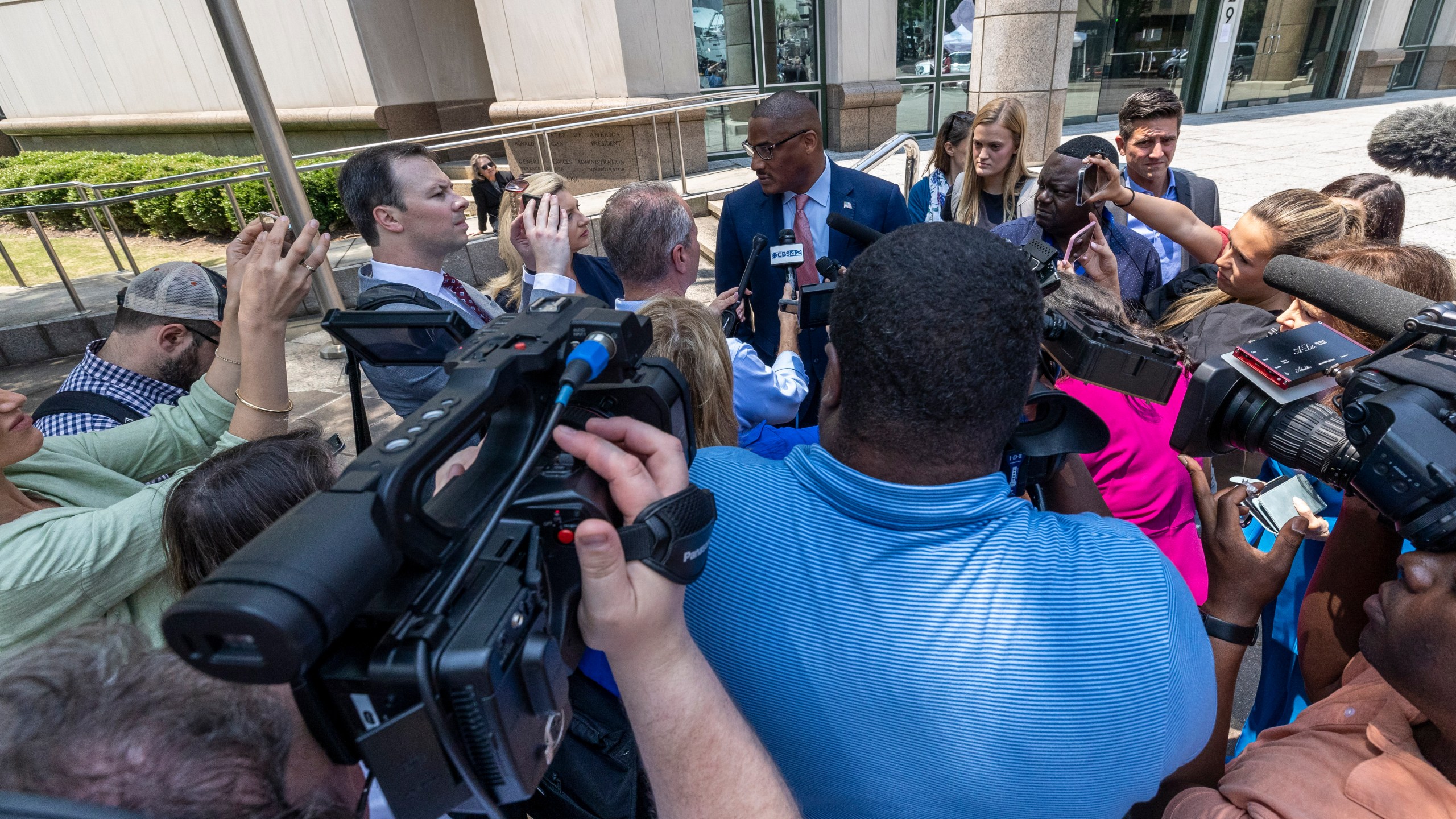 Beth Holloway's spokesman George Seymore talks with the media at the Hugo L. Black United States Courthouse, Friday, June 9, 2023, in Birmingham, Ala. Joran van der Sloot, the chief suspect in the 2005 disappearance of Natalee Holloway, was arraigned in federal court on charges related to extorting money from Holloway's mother. (AP Photo/Vasha Hunt)