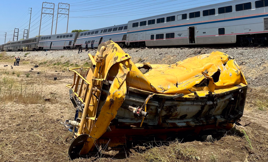 truck smashed after train crash