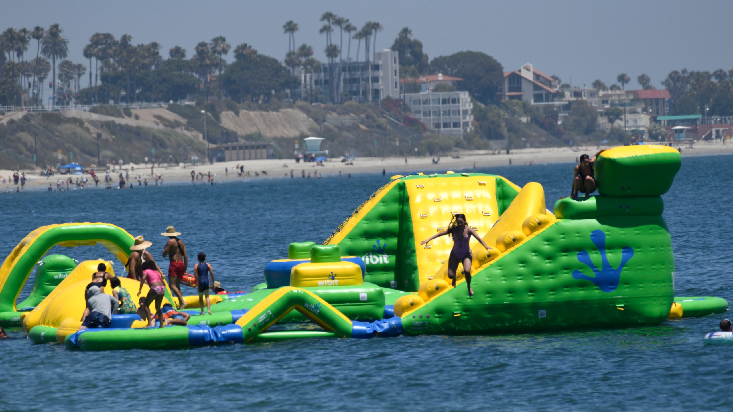 Long Beach's free floating Wibit aquatic playground is seen being enjoyed by swimmers. (Long Beach)