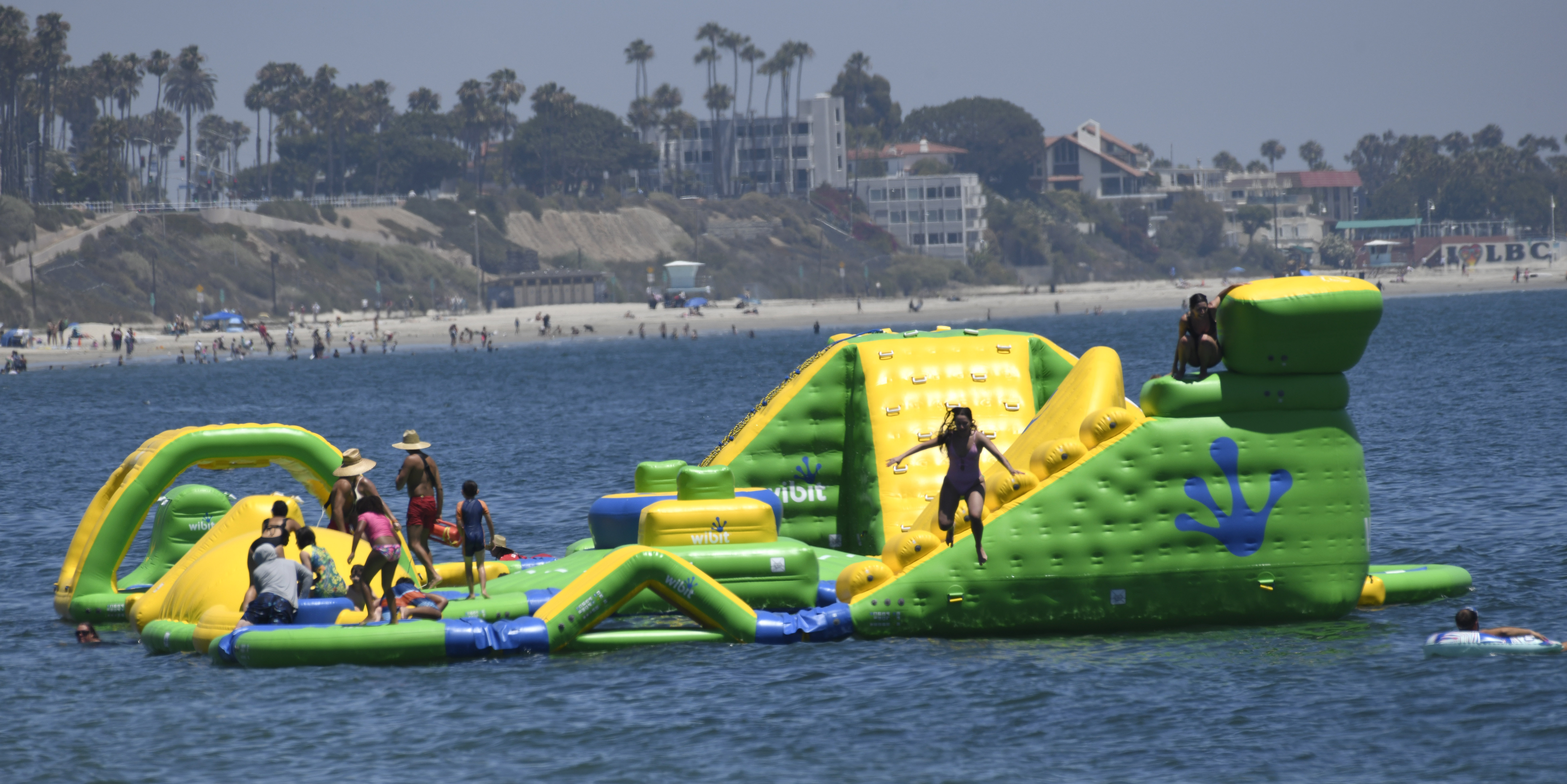 Long Beach's free floating Wibit aquatic playground is seen being enjoyed by swimmers. (Long Beach)