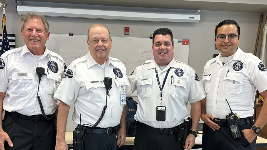 Gary (second from left) stands alongside other LAPD volunteers in a photo shared by the Police Department on June 28, 2023. Gary was recovering for several weeks after he was attacked by a swarm of bees in Encino in May. (Los Angeles Police Department)