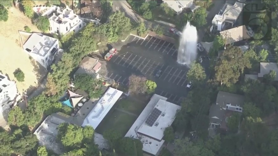 Firefighters responded to a school in Studio City flooded from a sheared hydrant leak on June 13, 2023. (KTLA)